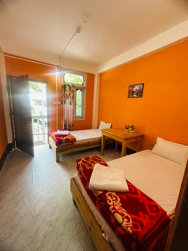 Twin bed room at Yangzom Homestay Dirang